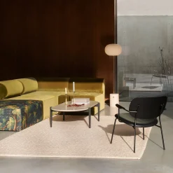 JWDA floor | Red travertine stone and bronzed brass