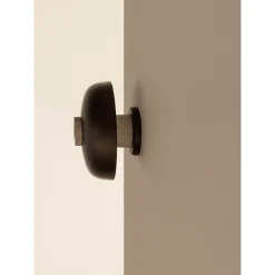 Reverse wall lamp | travertine and bronzed brass