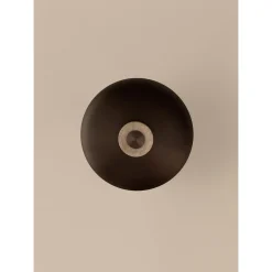 Reverse wall lamp | travertine and bronzed brass
